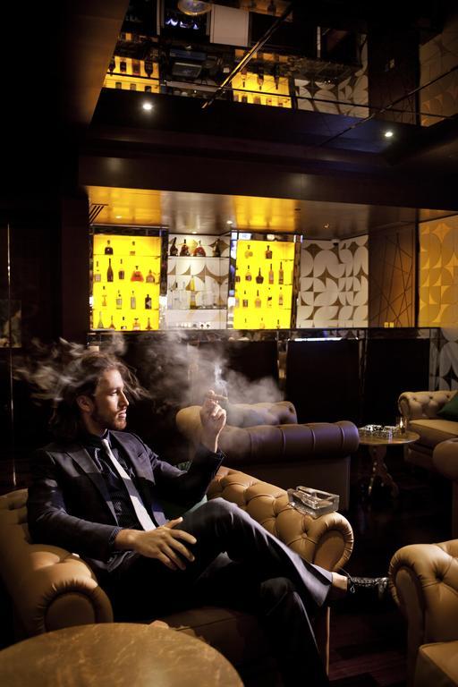 The Domain Bahrain Hotel And Spa - Adults Friendly 16 Years Plus Manama Ngoại thất bức ảnh A man smoking in a nightclub